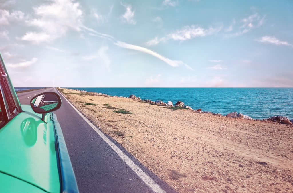 car by the beach