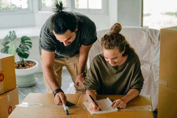 couple with a storage checklist